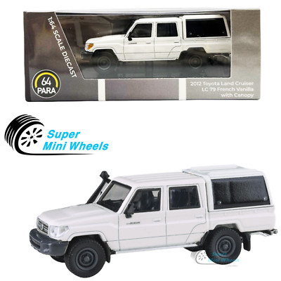 PARA64 1:64 2012 Toyota Land Cruiser 79 French Vanilla w/ Canopy