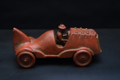 Unidentified reproduction? Red Cast Iron Fin tail Car with racer