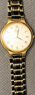 Pulsar Quartz Gold Tone Dress Wristwatch Roman Numerals White Dial Metal Band