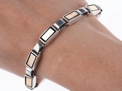 6.5'' Christin Wolf Native American 14k gold and sterling bracelet