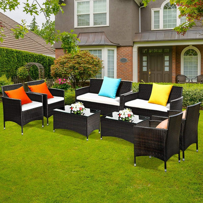 8-Piece Brown Rattan Patio Furniture Set with Cushions & Glass Table