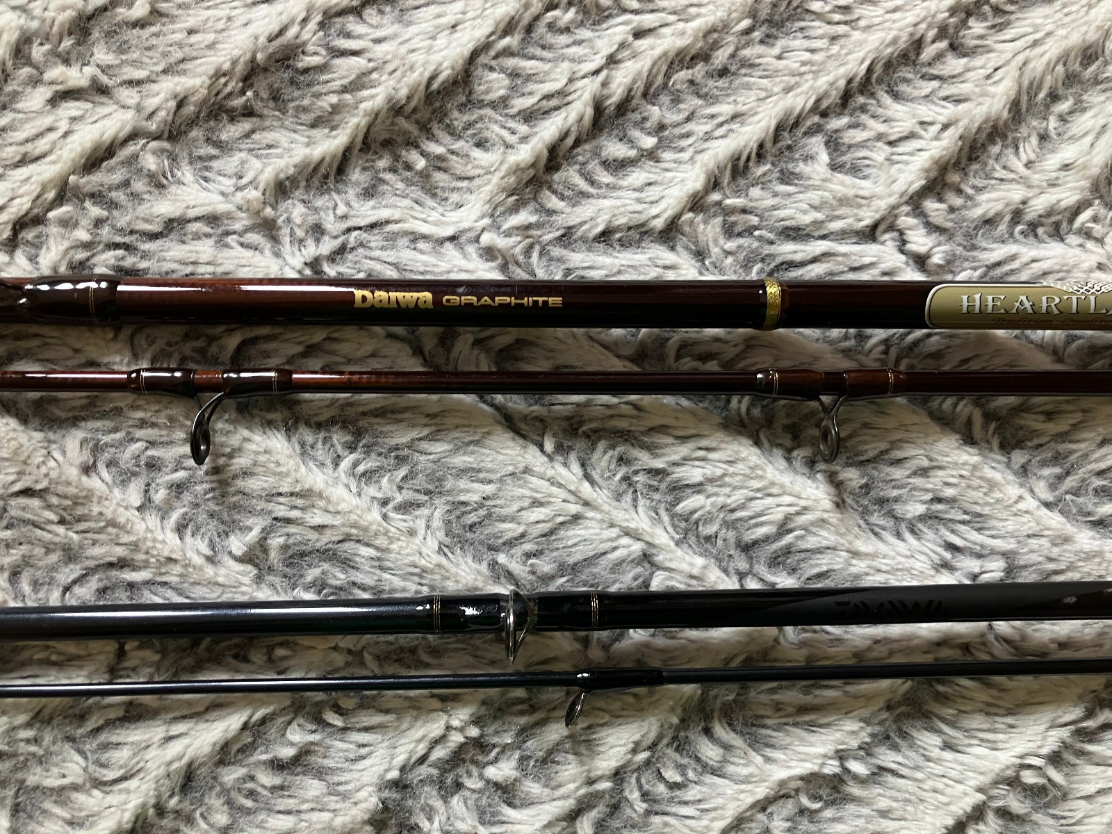 1 Daiwa Heartland - S and 1 Crossfire - Graphite fishing pol