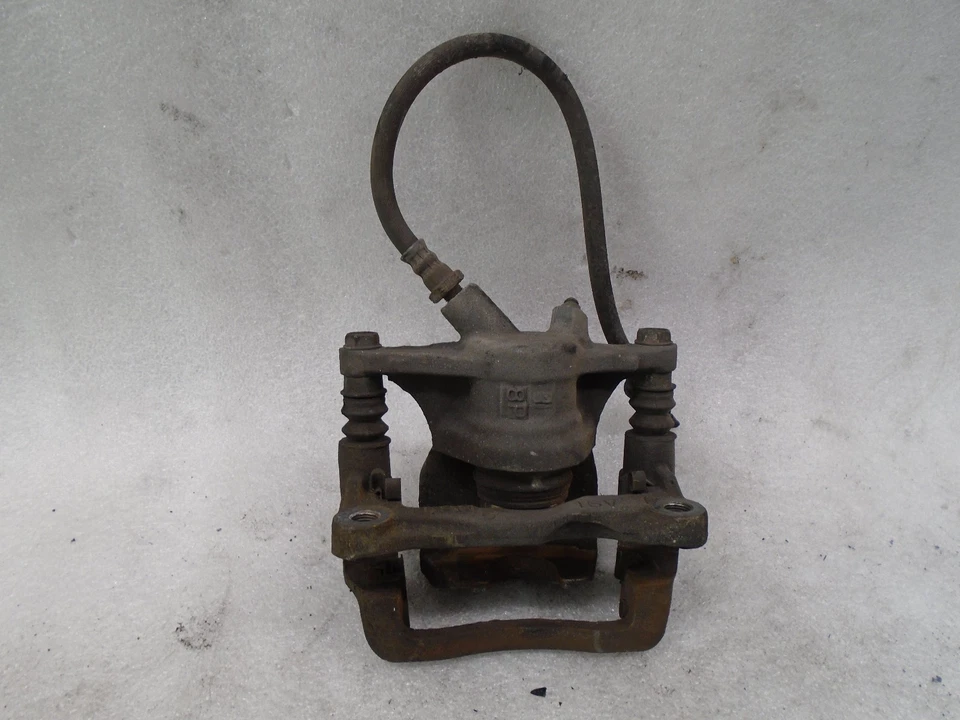 Pinza de freno trasera izquierda del lado del conductor Lexus LS400 1990-1992 OEM DK611312 Foto 2 de 4