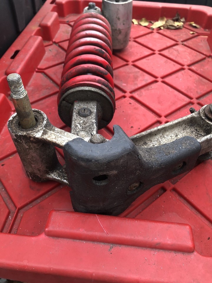 0308 KAWASAKI KFX 400 LTZ 400 OEM REAR SHOCK LINK AND SKID PLATE eBay