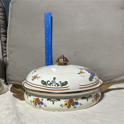 vintage Fissler Asta enamelware Dutch oven with a floral design and brass handle