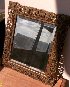 beveled gilded bronze mirror glass