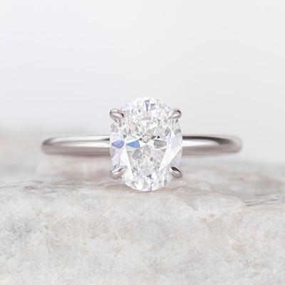 Lab Grown 1.60 TCW Oval IGI Certified Diamond (1.50 CT, E/VS2) Engagement Ring