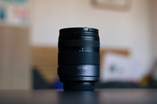 Panasonic LUMIX G Vario Lens 14-140mm f/4.0-5.8 + Lens Bag and Lens Hood