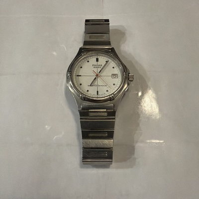 #ad Pulsar Time Y147 7040 Quartz Date 100m Water Resist Watch VINTAGE $29.99