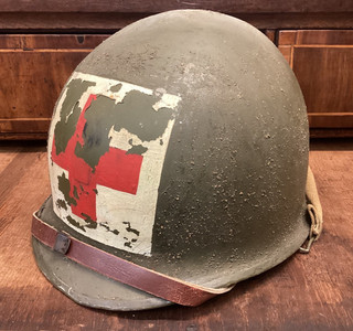 original ww2 1943 front seam McCord stamped medic helmet with liner