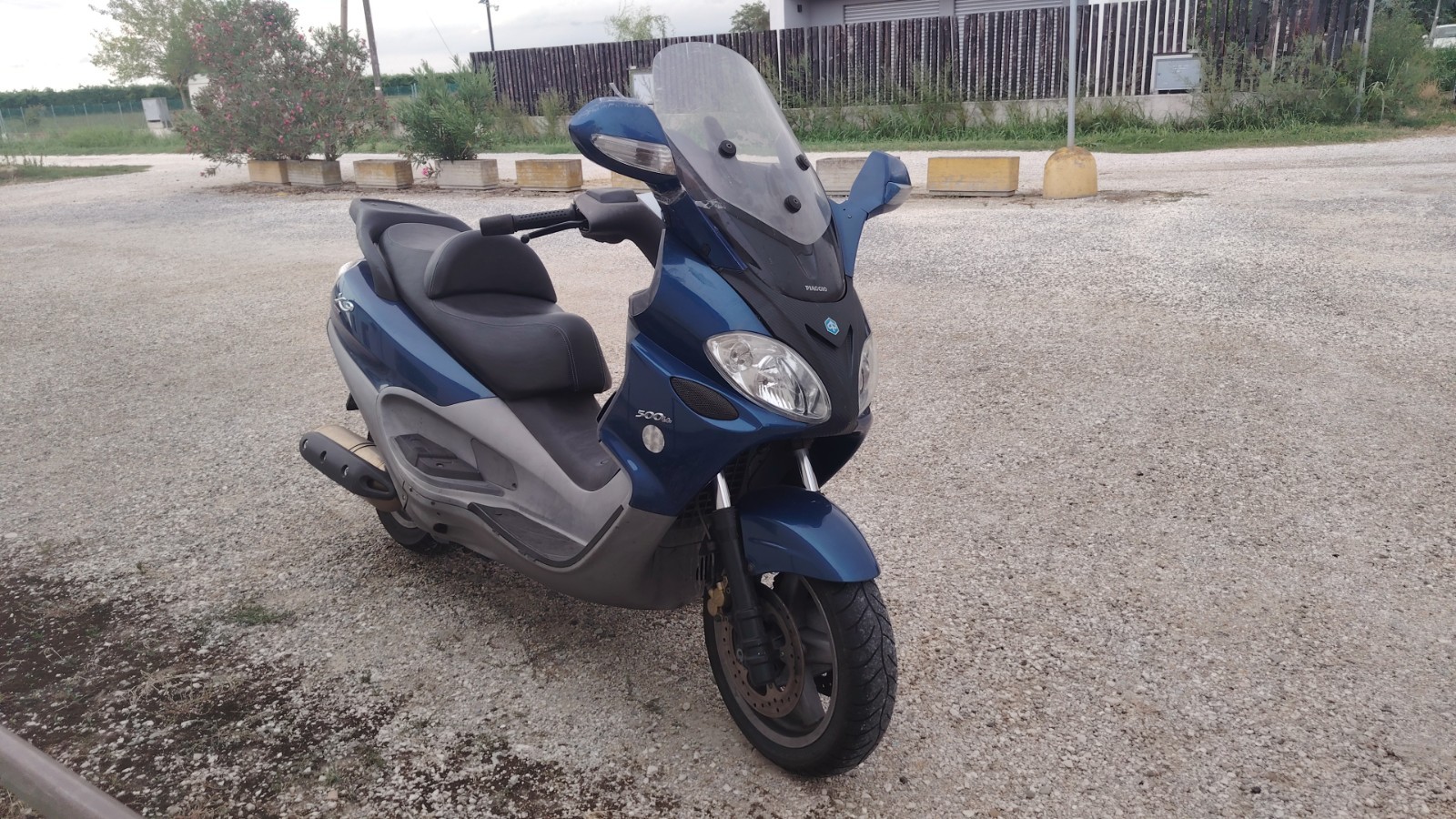Scambio Piaggio X9 500 con bicicletta elettrica