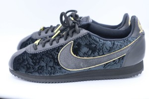 nike classic cortez womens black and gold