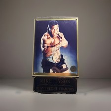 AUTHENTIC AUTOGRAPHED MIKE TYSON PHOTO ON PLAQUE WITH “heavy Weight Champion”