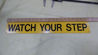Watch Your Step Sign, Yellow / Black, 3'' x 21'', 1.9'' Letters, Alum Backing, I2