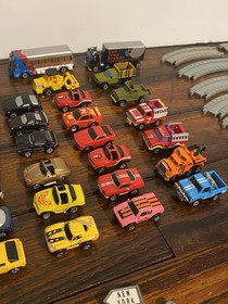 Vintage Micro Machines over 60 Mini Cars, Monster Trucks, Planes, and road.