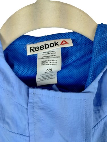 Chaqueta cortavientos pulóver con capucha azul Reebok juvenil talla M nailon poliéster - Imagen 10 de 14