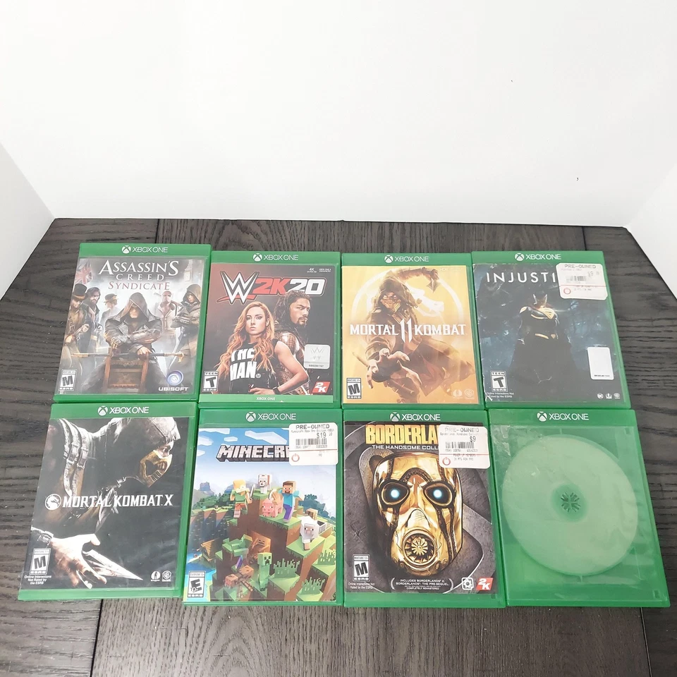 Lote de 7 juegos Xbox One: Mortal Kombat, Minecraft, WWE 2K20, Assassin's Creed Foto 4 de 4