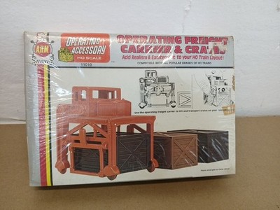 Vintage AHM 11010 HO Scale Operating Freight Carrier & Crates Sealed NOS