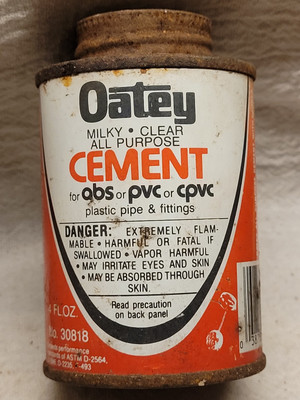 Empty Oatey Cement Tin Can
