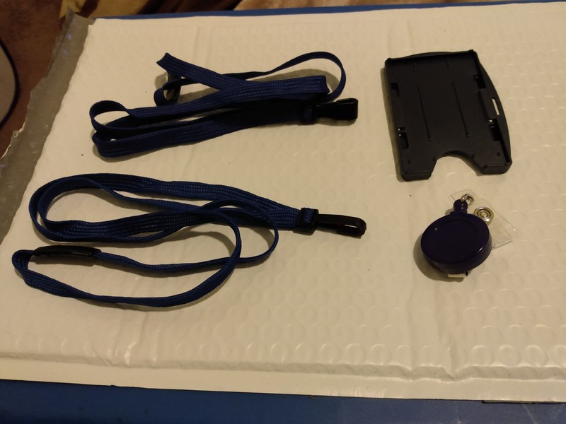 Two Blue Specialist ID Lanyards, One Badge Reel, and One Badge Holder (B)