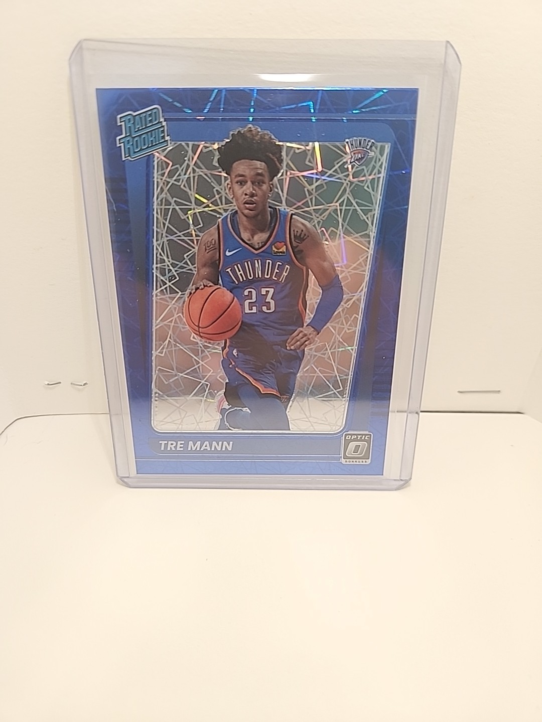 2021-22 Panini Donruss Optic - Rated Rookie Tre Mann #168 Blue Velocity Prizm RC