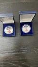 (2) 1999 AND 2000 AMERICAN SILVER EAGLE 1 OZ COINS COLORIZED UNC MILLENIUM SET.