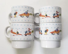 Bunnies w/carrot cars and seesaws stackable coffee cups by Signature Housewares