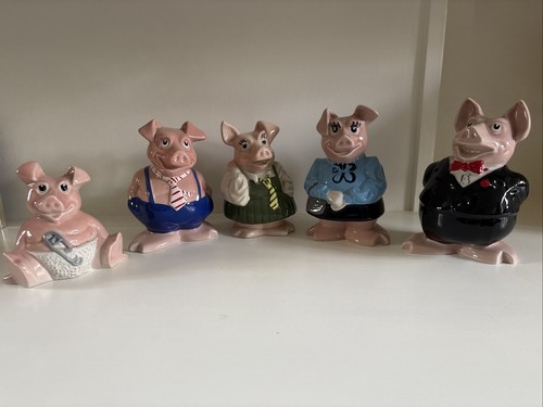 FULL SET OF NAT WEST PIGS MONEY BOXES with 1 stopper missing