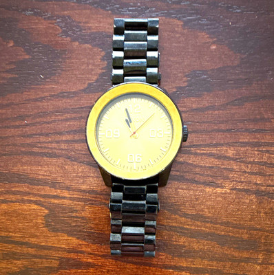 Nixon Corporal Men's Analog Gold Dial Black Steel Watch