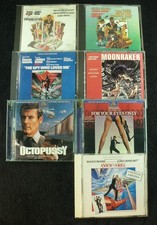 7 James Bond CDs: Live & let Die, Man with Golden, Spy who Loved, 4 more. GREAT!