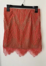 NWT San Joy lace skirt size large. Red orange lace skirt with nude lining