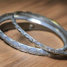 Set of 2 Silver tone textured metal bangle bracelets