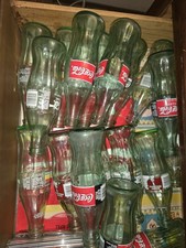 1990s Coca-Cola Bottles Lot of at least 6 bottles