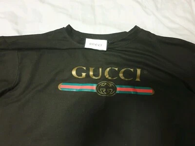 gucci shirt with writing on it