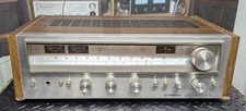 Pioneer SX-580 stereo receiver.  Classic silver face model with analog watt mete