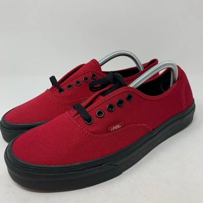 black vans with red laces