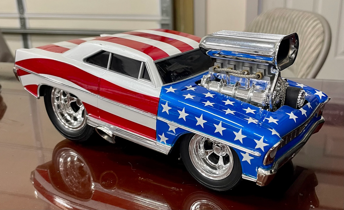 1966 Chevy Nova Muscle Machines Stars & Stripes 1:18 Scale Diecast