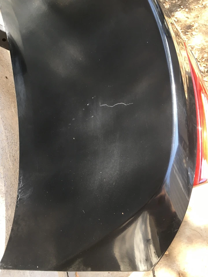 Tapa maletero Kia Optima EX 2011-2013 negra con retroiluminación OEM buen estado Foto 3 de 4