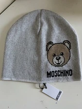 NWT MOSCHINO WOMENS BEANIE HAT. SILVER GLOW LUREX BEAR LOGO. MADE IN ITALY