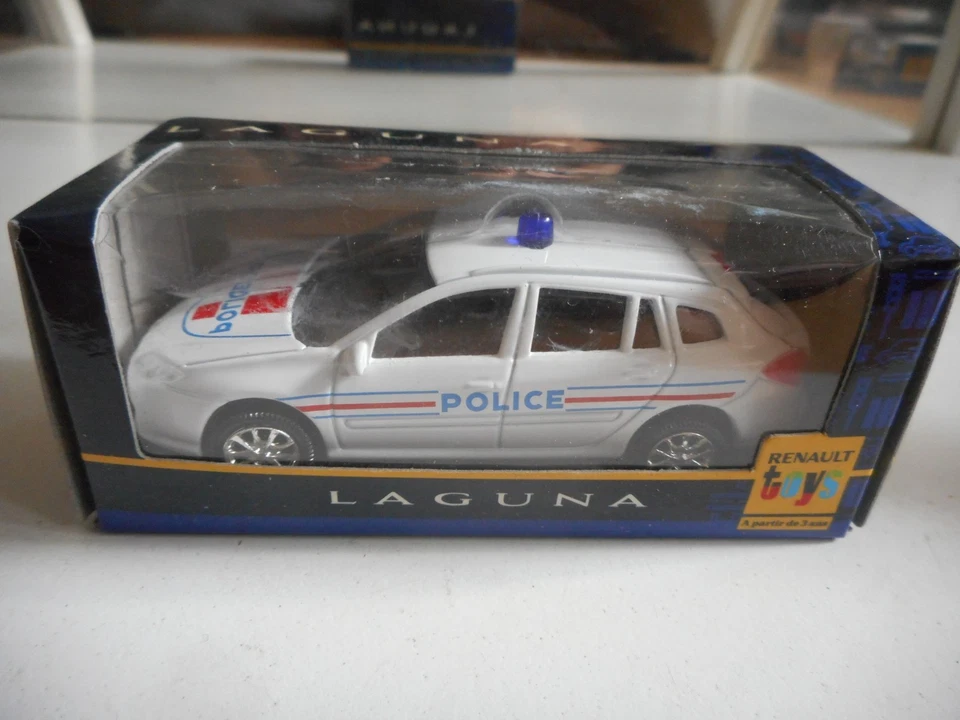 Norev Renault Laguna Police en blanc au 1:64 en boite - Photo 1/1