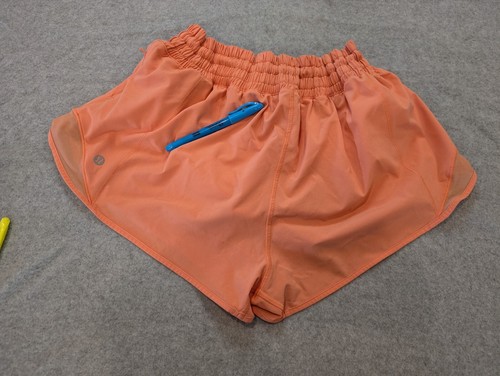 Lululemon Tracker Short Damen 10 orange gefüttert Mid-Rise Reißverschlusstaschen Athleisure - Bild 7 von 14