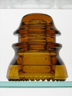 CD 14 [10] Dominion 42 orange amber glass insulator from Canada mint condition