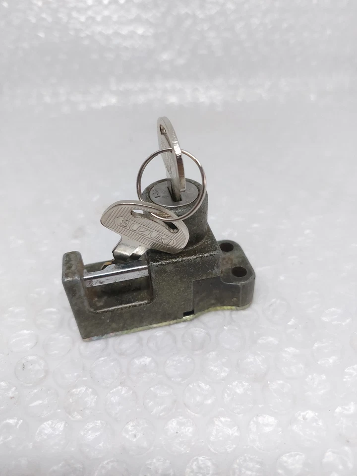 Cerradura asiento Suzuki GT185 GT250 GT380 GT550 GT750 RE5 GS550 GS750 GS1000 Foto 2 de 4