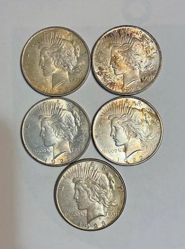 Lot of five 1922 & 1923 Peace dollars