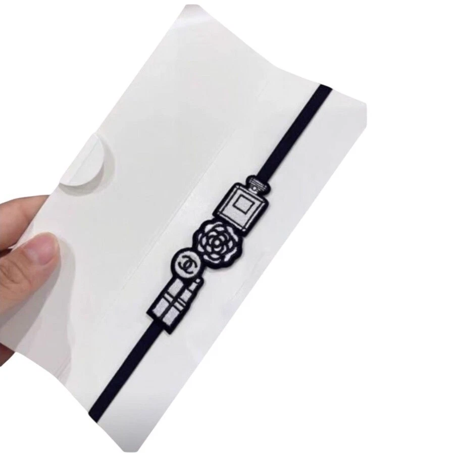 Marcador o diadema Chanel logotipo flor camelia nuevo Foto 2 de 4