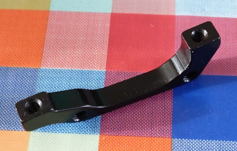 Unbranded 160mm IS post-mount disc brake adapter (9.8)