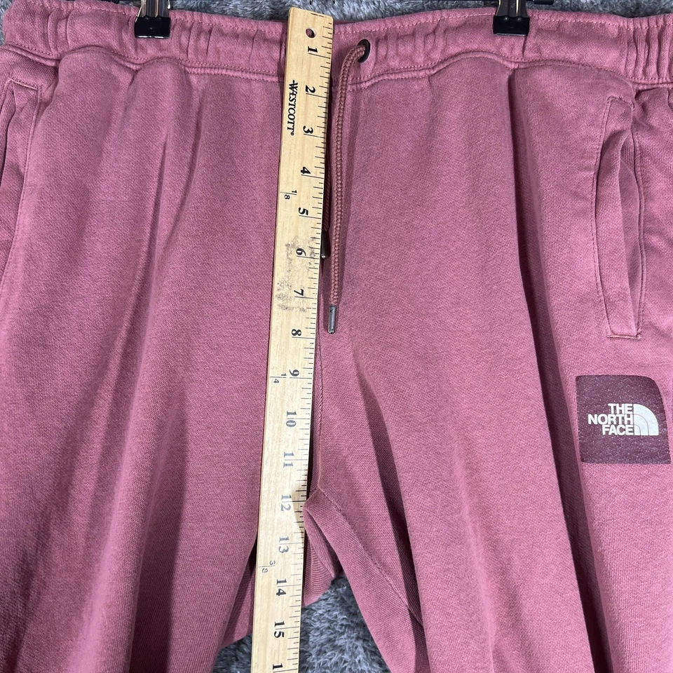 Pantalones deportivos The North Face para mujer grandes rosas forrados de vellón con logotipo bolsillos Foto 3 de 4