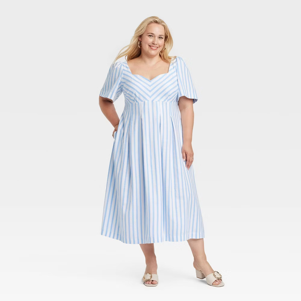 a new day dress Women's Midi Slip and you can pair it with your favorite footwear and accessories to complete the chic ensemble A New Day Women's Puff