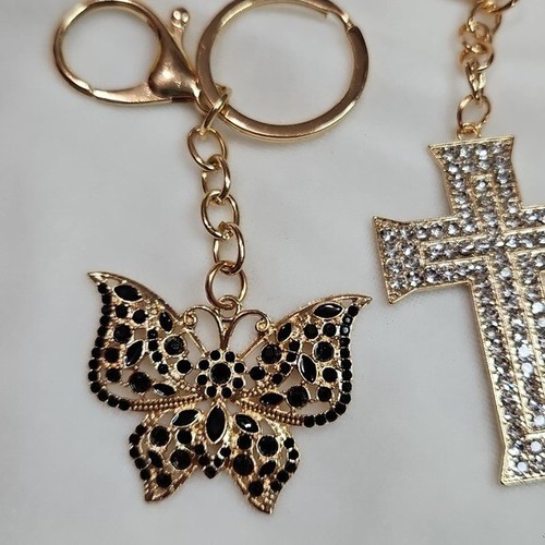 2er Set Schlüsselanhänger Taschenanhänger goldfarben Kreuz schwarz Strass Schmetterling Kristall - Bild 2 von 6