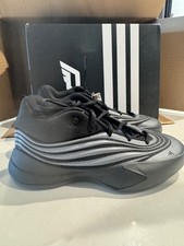 ADIDAS DAME XJ, multiple sizes youth 5 6.5 Black basketball shoes.